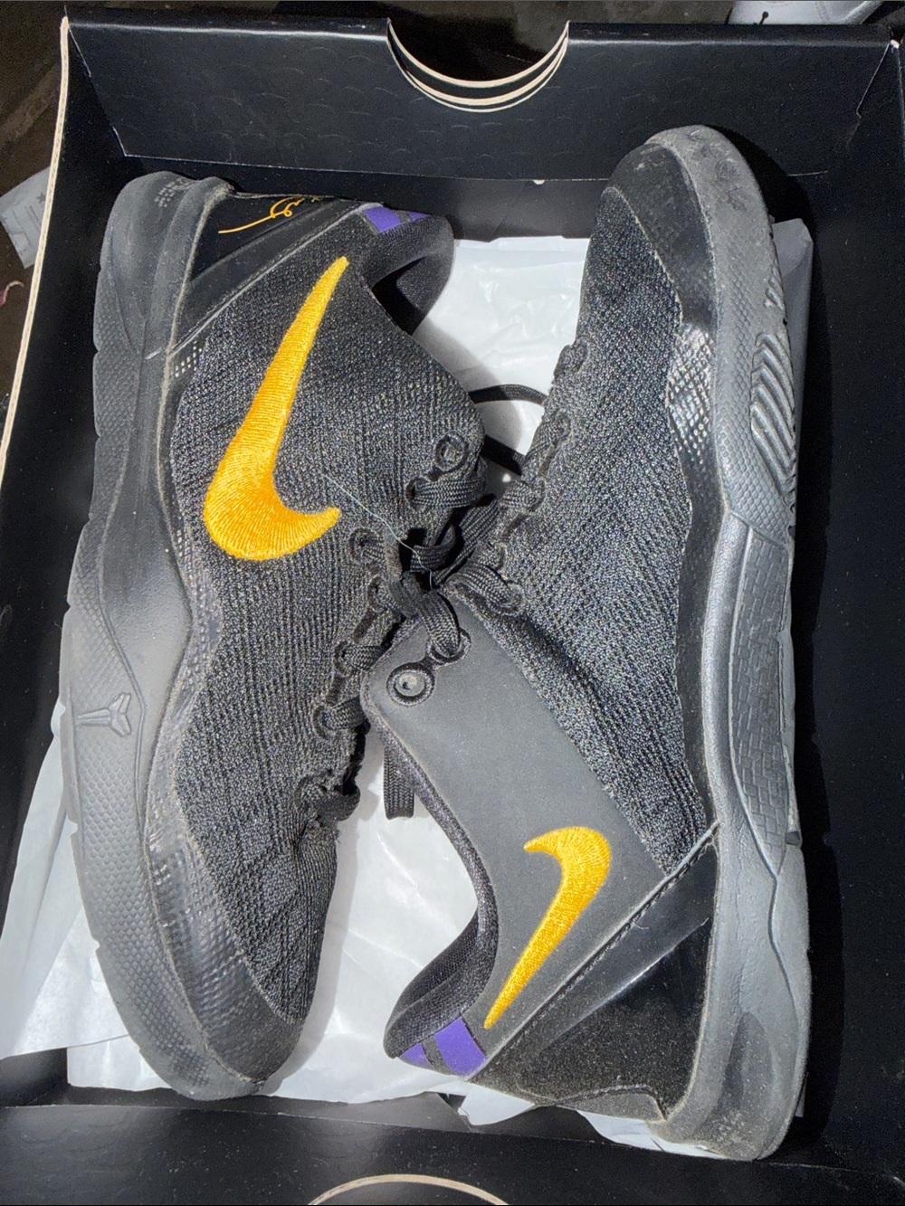 Nike Black Sneakers with Gold Swoosh and Purple Accents